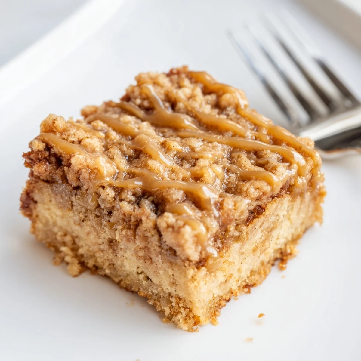 Tender coffee butter streusel bars topped with a buttery crumb topping.  