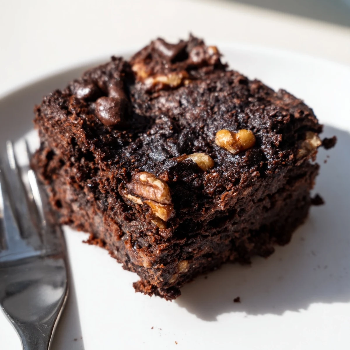 Delicious Zero-Waste Brownies made from leftover nut-milk pulp, served warm and gooey.