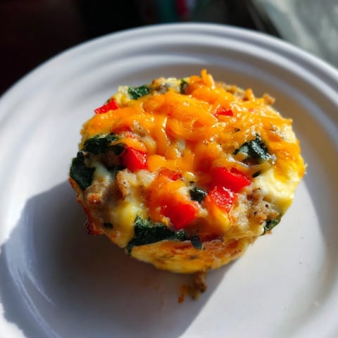 Golden brown One-Pot Breakfast Casserole Muffins filled with savory cheese, vegetables, and optional sausage.