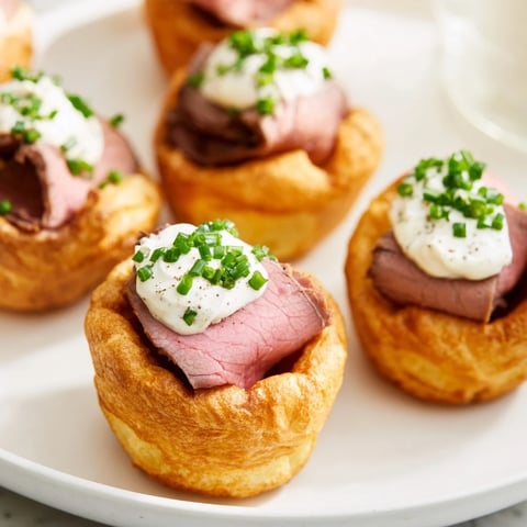 Golden, crispy Express Holiday Yorkshire Pudding Bites bursting with roast beef and creamy horseradish filling.