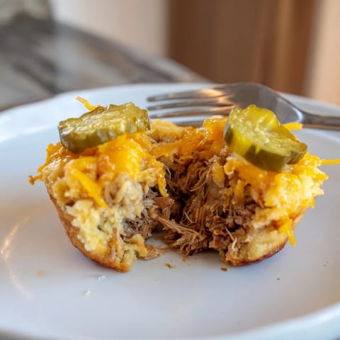 Delicious BBQ Pickle Pulled Pork Muffins filled with tender pork and tangy pickles.  