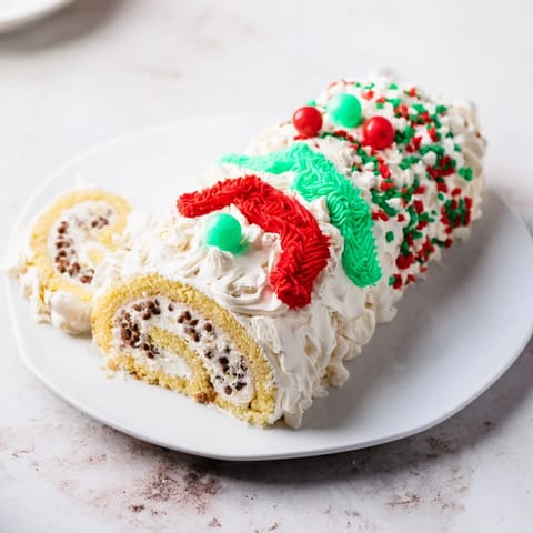 Homemade Ugly Sweater Cake Roll, a delicious holiday dessert with whimsical piped designs.