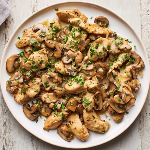 Creamy Chicken Stroganoff with tender chicken, a rich mushroom sauce, and fresh parsley, perfect for dinner.