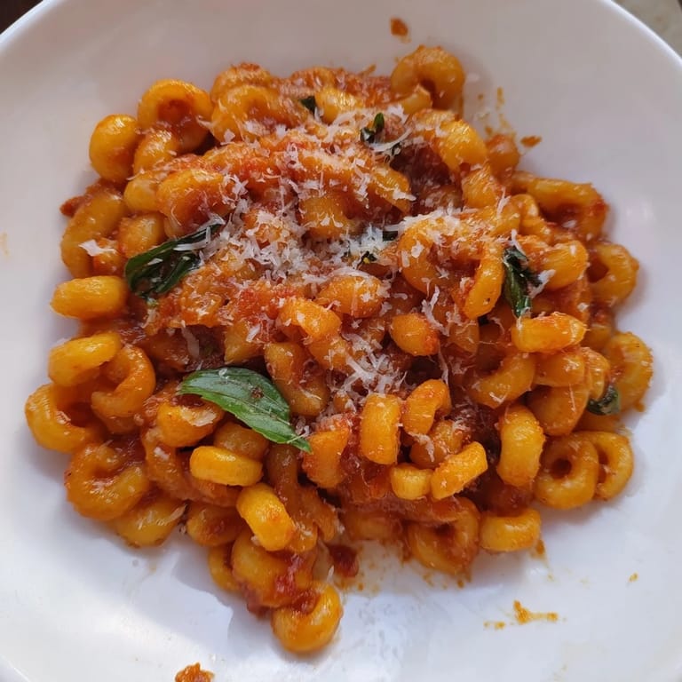 Creamy Spicy Vodka Sauce Ditalini bubbling with rich tomato sauce, ready to be served.